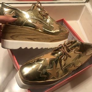 Platform sneakers/ metallic gold size 9